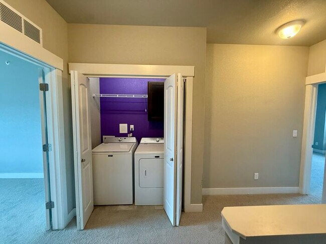 Building Photo - This townhome-style condo truly has it all!