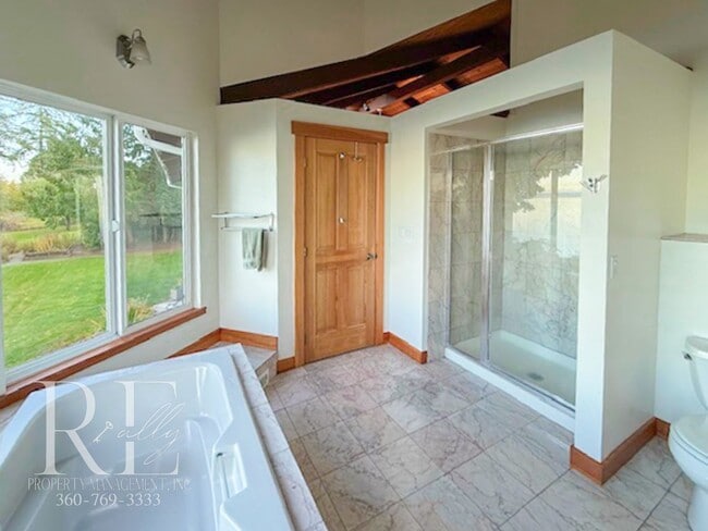 Building Photo - Waterfront Rustic Retreat with Vaulted Ceilings, Picture Windows & Lofted Nook