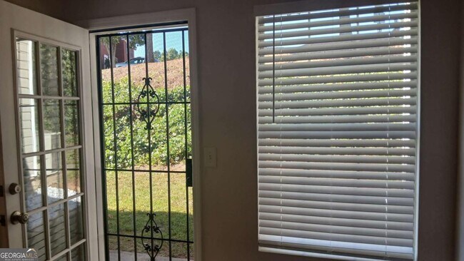 Building Photo - 5677 Wind Gate Ln