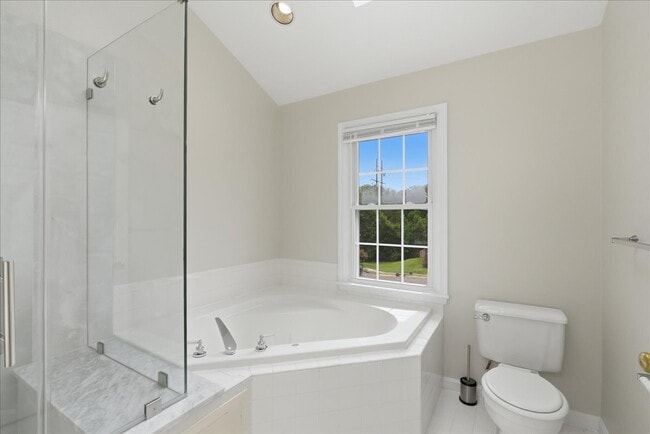 Building Photo - Welcome home to this beautifully updated and move-in-ready 3-bedroom, 3.5-bath townhouse