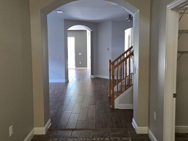 Building Photo - Freshly Painted 4BR/2BA Pool Home with Screened Pool & Spa – Move-In Ready!