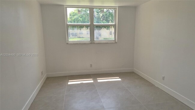 Building Photo - 6050 NW 64th Ave