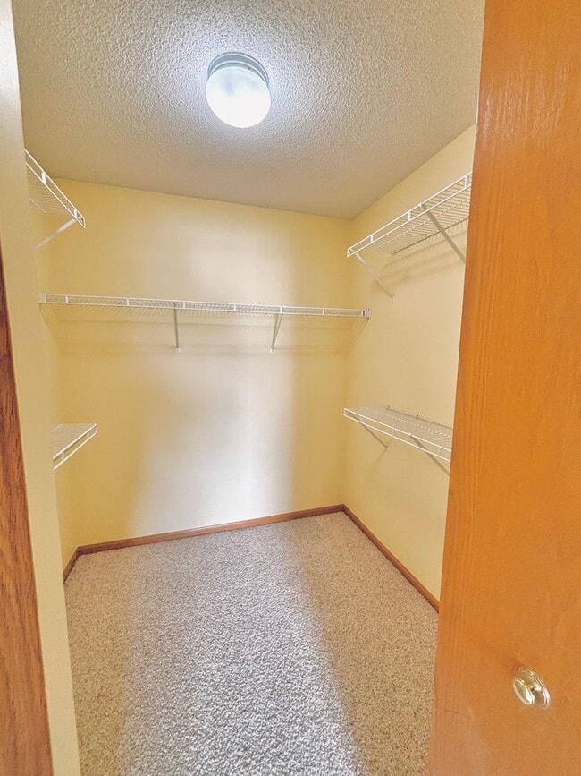 Building Photo - 2 Bedroom Townhome Nestled in The Heart of...