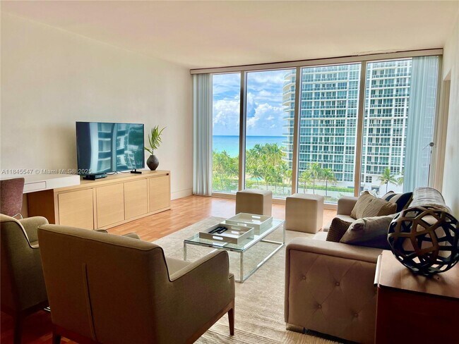 Building Photo - 10275 Collins Ave