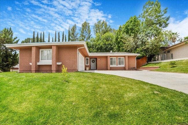 Building Photo - 7365 Pomelo Dr