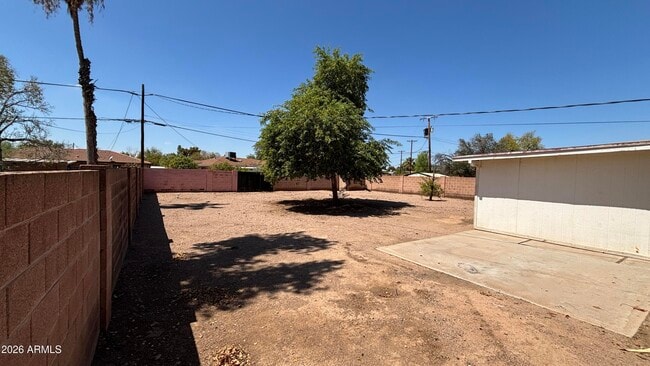 Building Photo - 5548 N 12th Ave