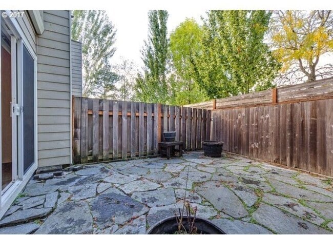 Building Photo - 9041 SW Rystadt Ln