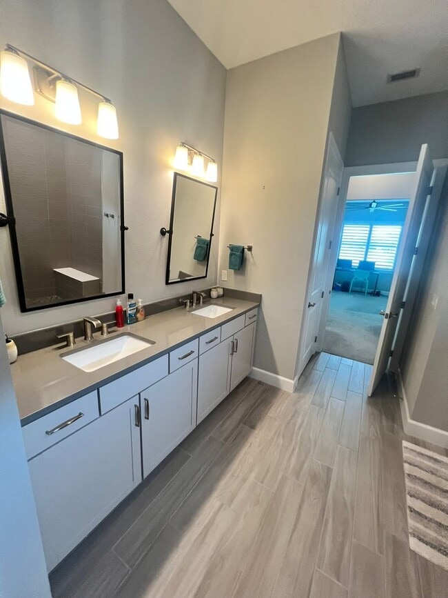 Building Photo - STUNNING LAKEFRONT 3 BEDROOM, 2.5 BATH HOM...