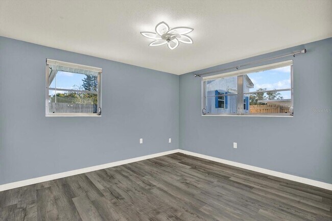 Building Photo - 7902 Canna Dr