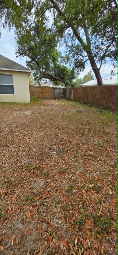 Building Photo - Spacious 3BR Home with Florida Room & Fenced Backyard