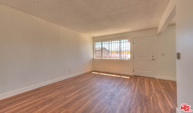 Building Photo - 8468 S Halldale Ave