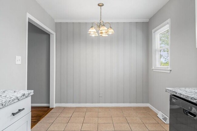 Building Photo - Updated Home with Hardwood Floors, LR & De...