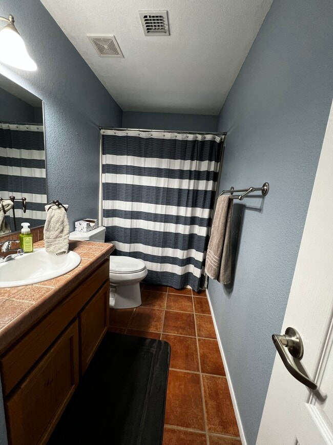 Building Photo - 8443 Forget Me not St