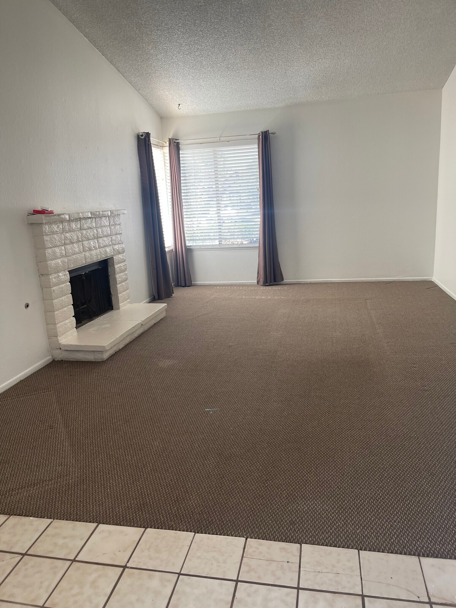 Spacious living room with fireplace - 3248 E Avenue S2