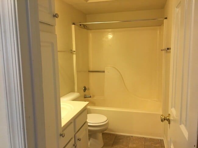Building Photo - ONE LEVEL CONDO NEAR REX HOSPITAL -Firepla...