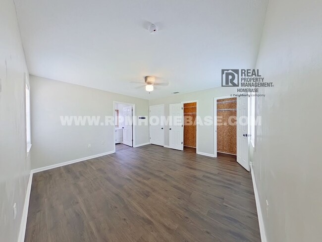 Building Photo - Spacious 4-Bedroom Home with Solar Panels ...