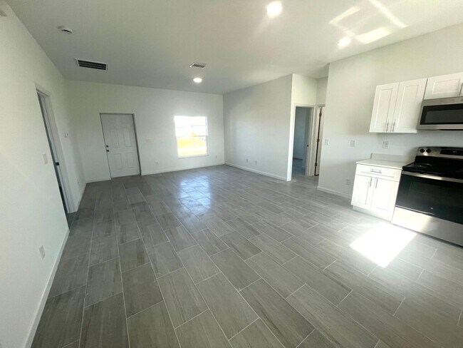 Building Photo - NEW CONSTRUCTION-  Modern 3 Bed / 2 Bath Home in Lehigh Acres