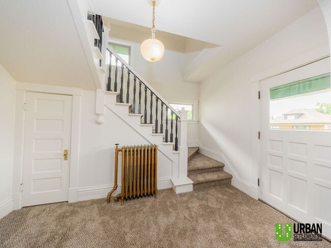 Building Photo - Spacious 4-Bedroom Home with 2-Car Garage, Basement Storage & Flexible Living Space in North Spokane
