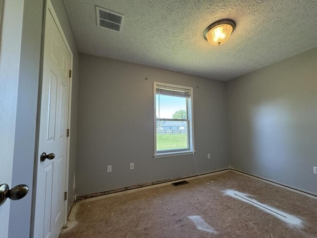 Building Photo - 5709 N 12th Ave