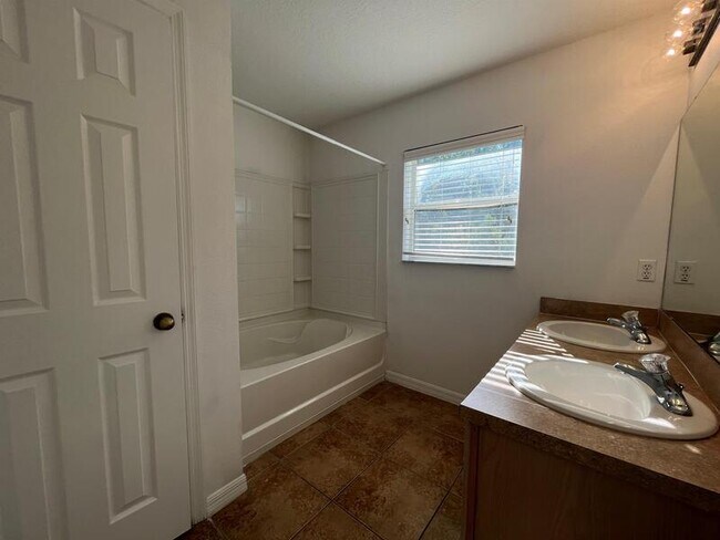 Building Photo - 15630 Sarcee Ct