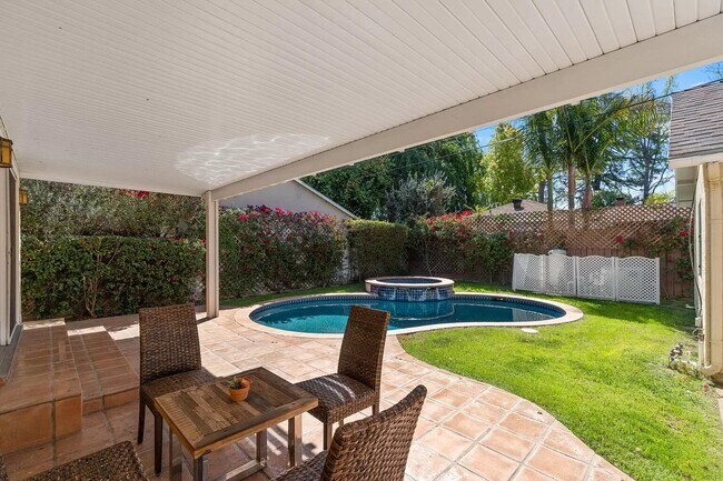 relax and rejuvenate under the patiio - 14024 Peach Grove St