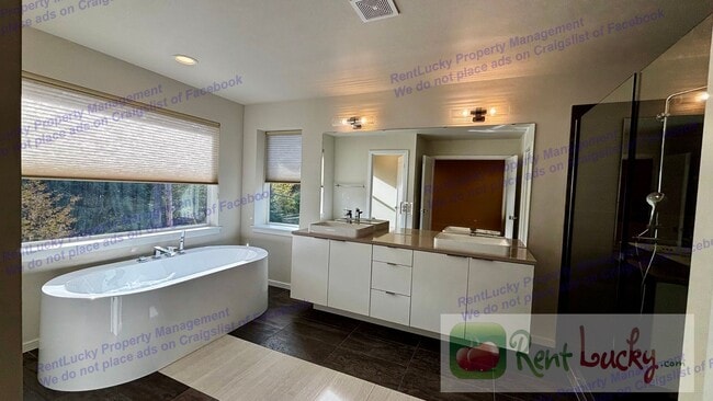 Building Photo - STUNNING 4-Bedroom Lake Tapps Home w/2-Car Garage and A/C!!