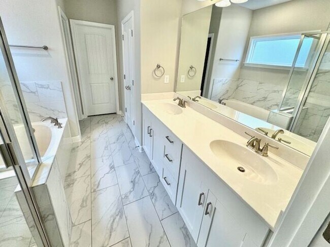 Building Photo - Now Leasing in Millington @ Winstone. 4-Be...