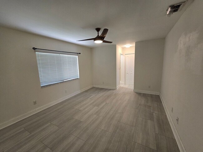 Building Photo - 3 Bedroom W/ Den + Office Space + 2 Car Garage and Fenced in Yard - Annual Rental