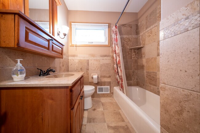 Building Photo - 10932 Russell Ave S