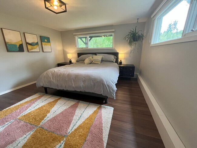 Building Photo - Spacious 4-Bedroom Home with Lush Landscap...
