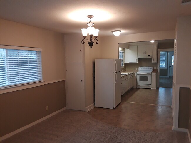 Dining looking into kitchen - 608 Elefa St