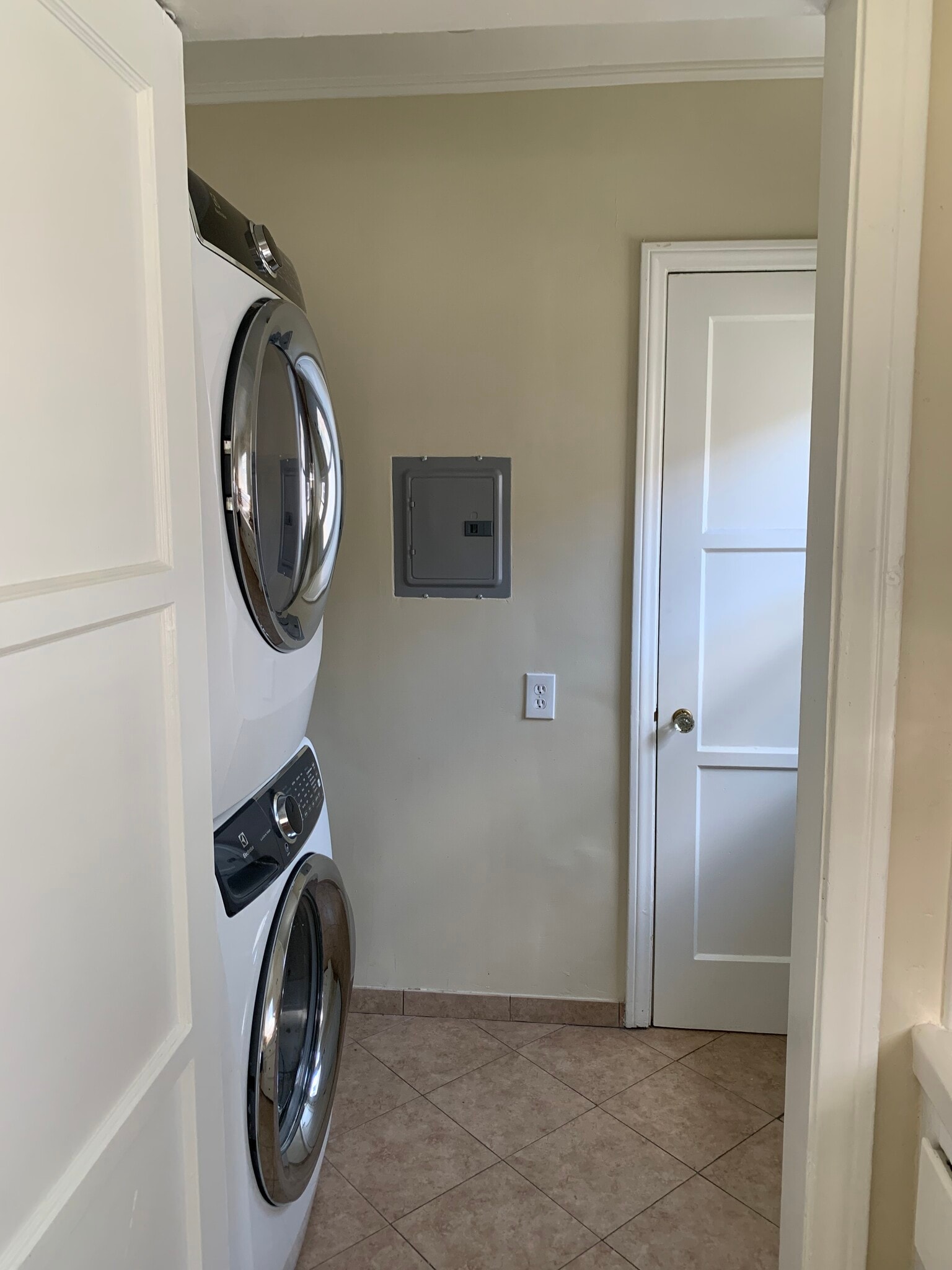Stackable washer/dryer in service porch - 318 N Bushnell Ave