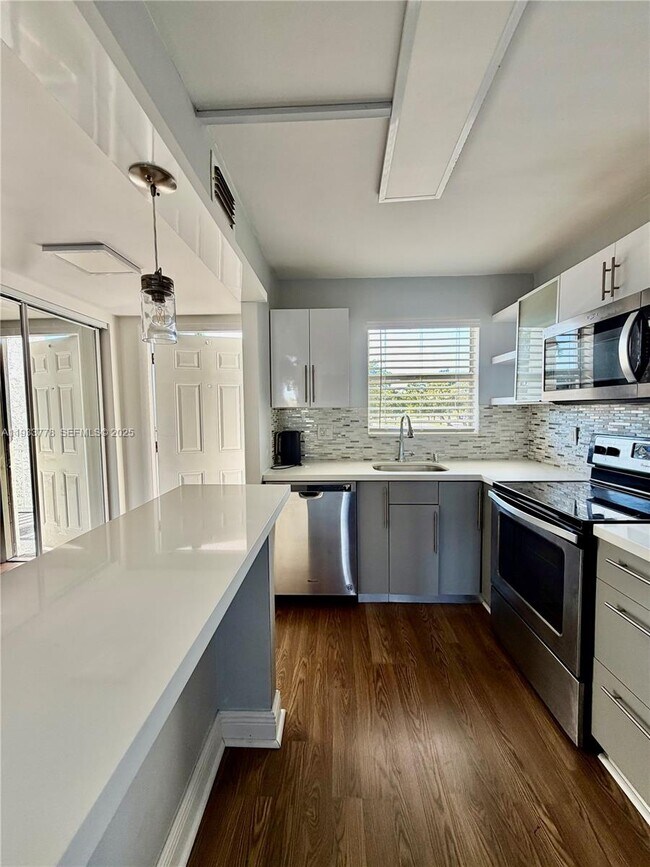 Building Photo - 8350 Sunrise Lakes Blvd