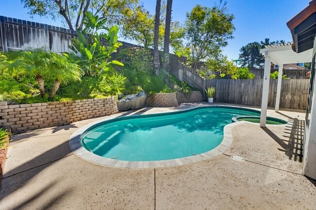 Building Photo - Stunning Upgraded 4BR Home with Pool in Desirable Rancho San Diego – Move-In Ready