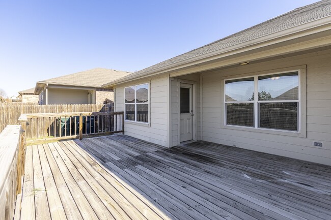 Building Photo - Kyle Home has Large Deck for Entertaining!