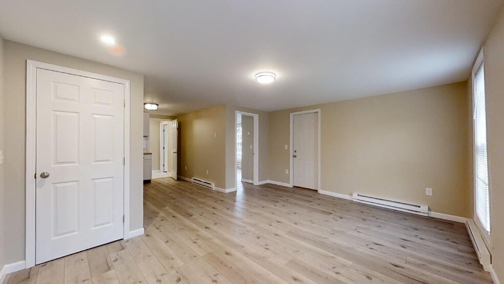 Living Room / Door to Bdrm and Front Porch - 173 S Main St