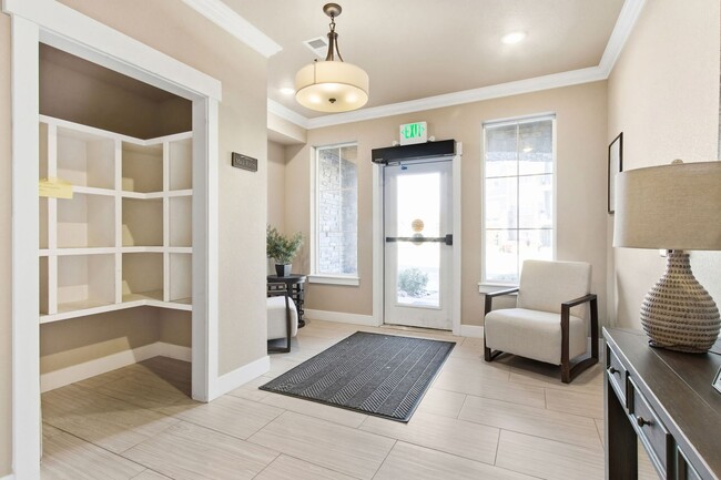 Building Photo - Bright and Modern Condo in Ideal Location with Detached Garage