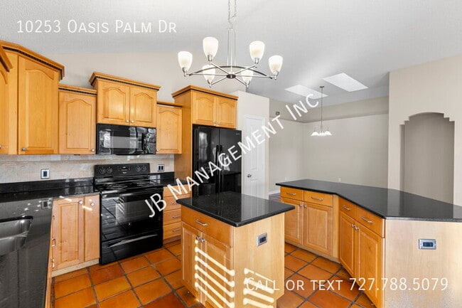 Building Photo - 10253 Oasis Palm Dr