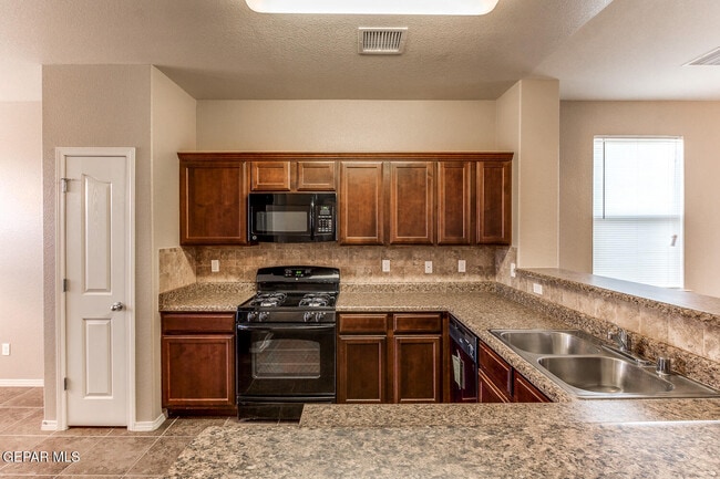 Building Photo - 14466 Miguel Terrazas Dr