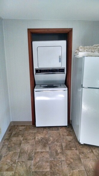 Laundry located in kitchen near back entry - 507 N Division Ave