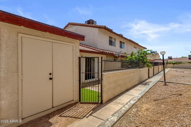 Building Photo - 6454 E University Dr