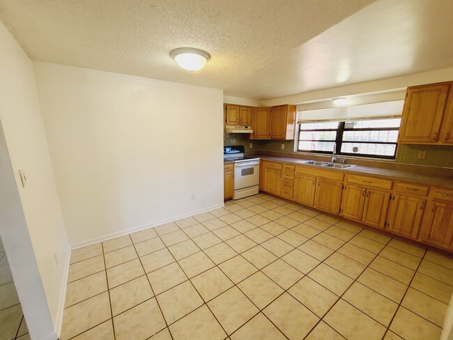 Building Photo - Charming Four Bedroom One Bathroom House photos coming soon