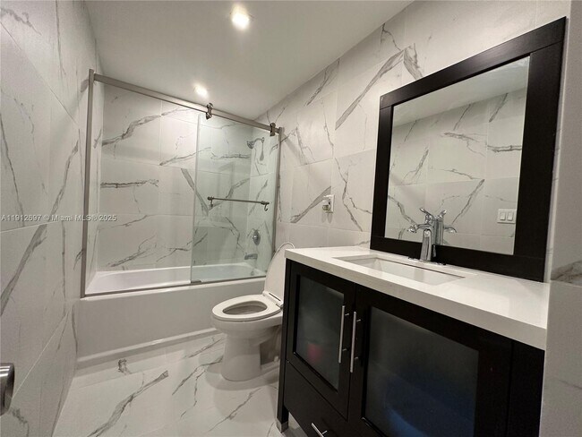 Building Photo - 19380 Collins Ave