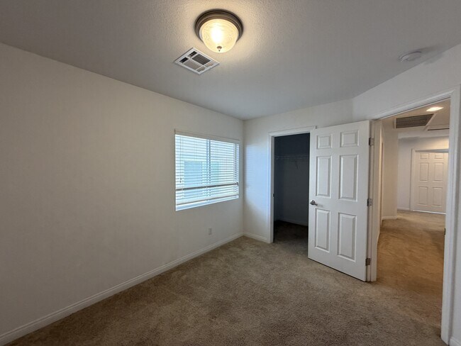 Building Photo - 7869 Tyrell Peaks St