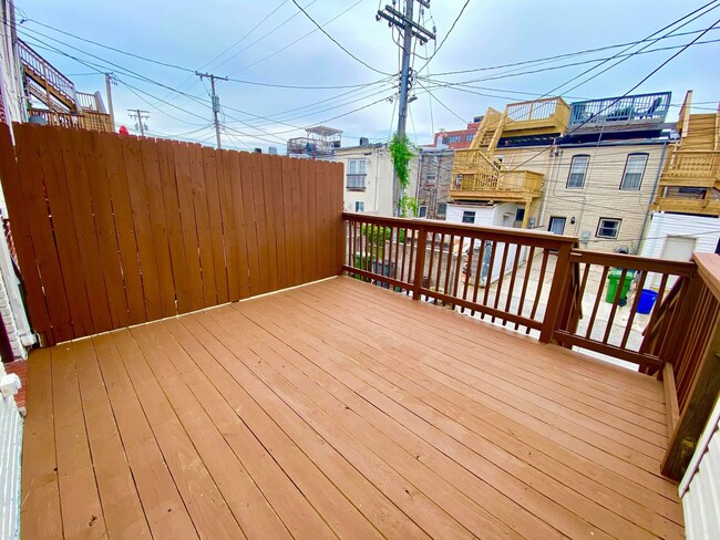 Building Photo - Exceptional 2bed/3ba Patterson Park Home - Large Rear Deck & Parking Pad!