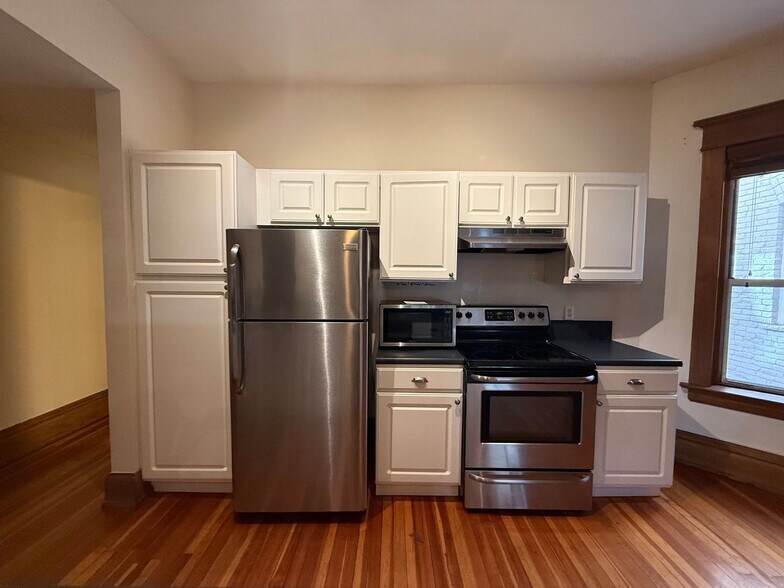 Building Photo - 1210 E Colfax Ave