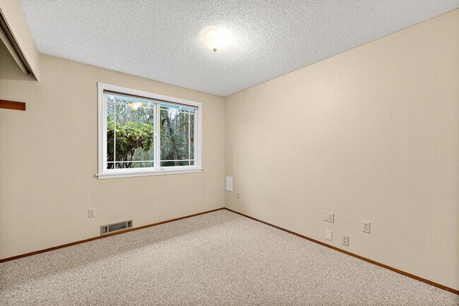 Building Photo - Charming Tacoma Home with A/C, RV Parking, Workshop & Skylit Living Room