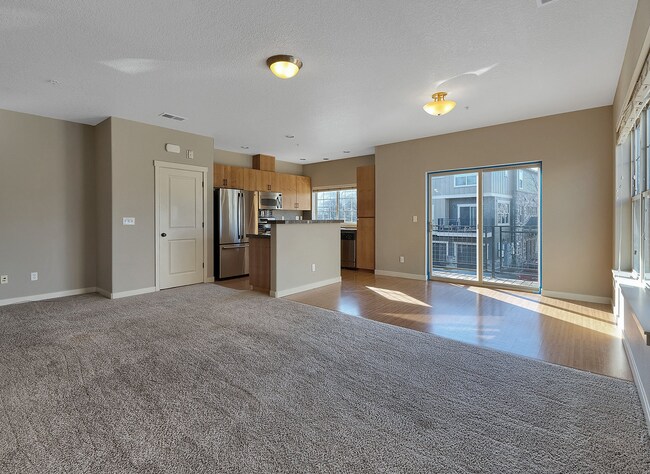 Building Photo - 2BR + 2.1BA Corner Townhome-Style Condo — Dual Primary Suites, Attached Garage & Most Utilities I...
