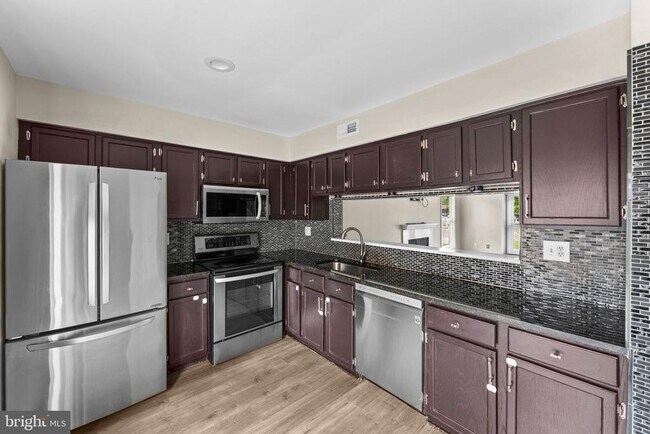 Building Photo - 7302 Rokeby Dr