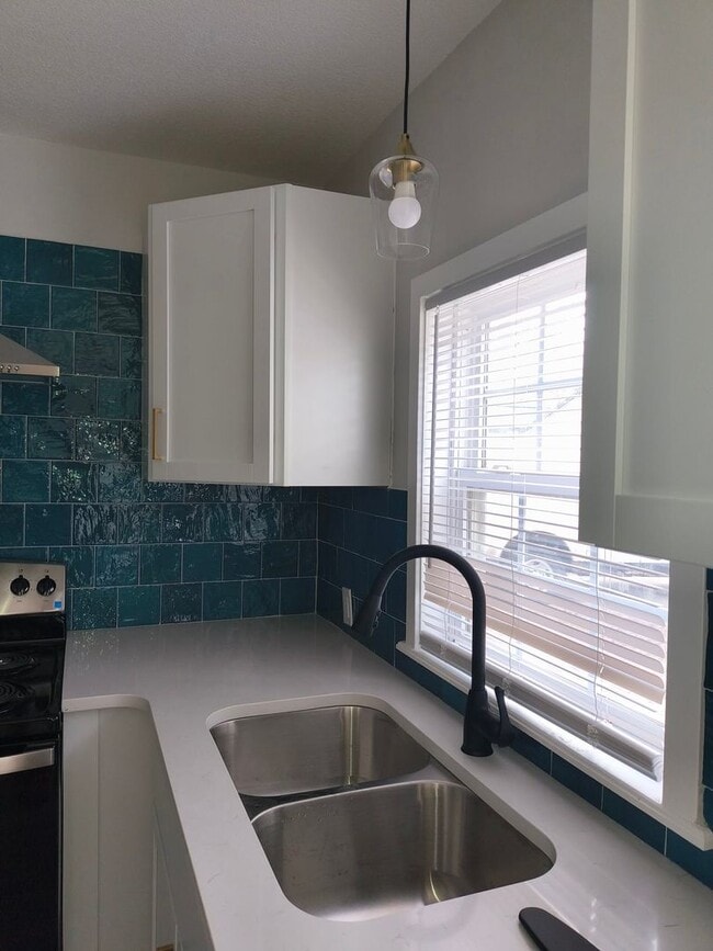 Building Photo - Welcome to Your Next Home with Harvest Investments!